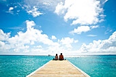 Couple In Cotton House Beach In Mustique Island, St Vincent And The Grenadines, West Indies