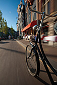 Cycling down cycle path, Amsterdam, Holland