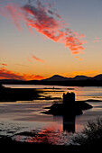 Silhouette of Castle Stalker at dusk, Appin, Argyll and Bute, Scotland