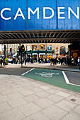 View Of Tourists From Under The Bridge In Camden Town, North London, Lonoon, Uk