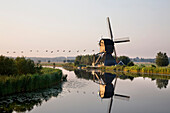 Wind Mill On A Canal, Holland