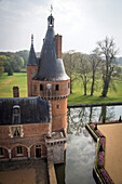 the red brick tower and the french-style gardens created in 2013 following the original plans by andre le notre commissioned by louis xiv for francoise d'aubigne, chateau de maintenon, eure-et-loir (28), france