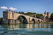 saint benezet bridge, called the bridge of avignon, situated on the rhone, the popes' palace and the cathedral notre dame des doms, city of avignon, called city of the popes and listed as a world heritage site by unesco, vaucluse (84), france