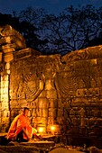 Camdodia, Banteay Mean Chey Province, Banteay Chhmar temples, Site World Heritage of Humanity by Unesco in 1992, Banteay Chhmar temple, the monk Chean Som praying in front of Avalokiteshvara, a major character of Buddhism
