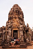 Cambodia,Siem Reap,Angkor Wat,Bayon Temple,European Couple Eating Breakfast Amongst Ruins
