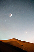 Morocco, Draa Valley, Tinfou, Tinfou dunes, Dunes in the Milky Way starry sky, Crescent moon