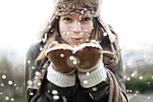 Portrait of a teenage girl wearing a fur hat