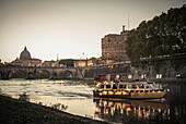 Boat floating on river, Rome, Italy