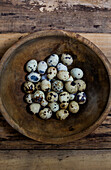 Bowl of Speckled Quail Eggs, High Angle View