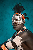 Black man wearing traditional body paint