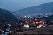Illuminated buildings and cityscape in mountains, Thimphu, Thimphu, Bhutan