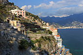 Cliff side view towards Atrani and distant Maiori, Costiera Amalfitana (Amalfi Coast), UNESCO World Heritage Site, Campania, Italy, Europe