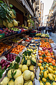 Fruit, including local lemons and oranges, displayed outside a shop in a narrow street, Sorrento, Campania, Italy, Europe