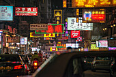 illuminated advertising at night around Nathan Road on busy street, Hongkong Island, China, Asia