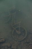 bike rotting at sea ground at fishing village Tai O, Lantau Island, Hongkong, China, Asia