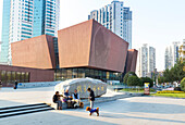 Square in front of Qian Xuesen Library, aviation museum, modern architecture, people chatting, dog,  Shanghai Jiao Tong University, Shanghai, China, Asia