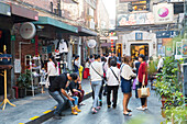 Young people, Tianzifang, arts and crafts area, visitors on street, shops, shopping street, French Concession area, Shanghai, China, Asia