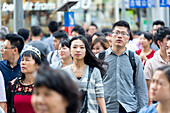 Beautiful women, young man, Chinese crossing a junction, crossroads, many people, faces, portraits, Nanjing Lu, nanjing street, shopping street, Shanghai, China, Asia
