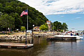 Boats docked with the American Flag flying, McGregor, Iowa, United States of America