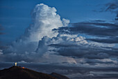 Thunderheads or cumulo nimbus clouds build up over the city of Cochabamba, Cochabamba, Bolivia