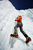 Climbing an ice wall, Saint-Donat, Quebec, Canada