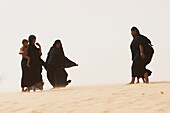 Tuareg women and children on a sand dune near Timbuktu, Mali