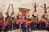 Dancers wearing Kananga mask at the Dama celebration in Tireli, Mali
