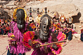 Dancers wearing Kananga masks perform at the Dama celebration in Tireli, Mali