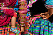 Close up of women wearing baby and traditional clothing