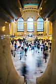 Blurred view of people in train station, New York, New York, United States