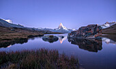 The Matterhorn reflected in Stellisee at sunrise, Zermatt, Canton of Valais, Pennine Alps, Swiss Alps, Switzerland, Europe