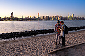 view to Manhattan from the State of New York - East River State Park, beach, East River, Empire State Building, sunset, Williamsburg, New York City, USA, America