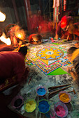 Buddhist monchs prepare a sand mandala with coloured wheat flour. The ceremony lasts for several days. Only very few visitors are granted entrance to this very seldom ceremony. Even less are allowed to take photographs. Lo Manthang (3840 m), former capita