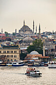 Cruise on the Golden Horn with Mosque behind, Istanbul, Turkey, Europe