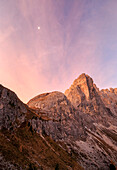 Pink sky at dawn on the peaks of Forcella De Furcia, Funes Valley, South Tyrol, Dolomites, Italy, Europe