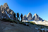 Hikers venturing to discover the Three Peaks of Lavaredo, Sesto, Dolomites, Trentino-Alto Adige, Italy, Europe