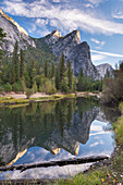 The Three Brothers reflected in the River Merced, Yosemite National Park, UNESCO World Heritage Site, California, United States of America, North America