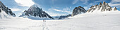 Adventurous bride and groom get married on a glacier in Denali National Park.