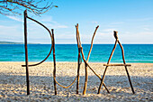 Sign made from wood branches on Puka Shell Beach, Boracay Island, Aklan Province, Western Visayas, Philippines