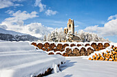 The church of San Gian surrounded by snowy woods, Celerina, Engadine, Canton of Grisons Graubunden, Switzerland, Europe