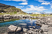 Hikers admire the view at Lake Grevasalvas, Engadine, Canton of Grisons Graubunden, Switzerland, Europe