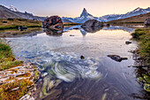 The Matterhorn reflected in Lake Stellisee at dawn, Zermatt, Canton of Valais, Pennine Alps, Swiss Alps, Switzerland, Europe