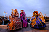 Masks and costumes at St. Mark's Square during Venice Carnival, Venice, Veneto, Italy, Europe