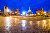 Plaza de Armas Fountain, Cusco Cathedral and Church of the Society of Jesus at night, UNESCO World Heritage Site, Cusco Cuzco, Cusco Region, Peru, South America