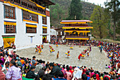 Crowds watching the dancers at the Paro festival, Paro, Bhutan, Asia