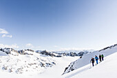 group ski touring, avalanche assessment on a skitour, risk management with groups, Heji Zwaechte, Obergoms, Berner Oberland, Switzerland