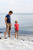 Father and son on the beach, dream beach between Strandmarken und Dueodde, sandy beach, summer, Baltic sea, Bornholm, Strandmarken, Denmark, Europe, MR