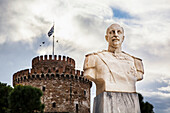 White bust of lieutenant Nicholaos Votsis and the White Tower, Thessaloniki, Greece