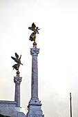 Pillars with angel sculptures, Rome, Italy