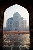 Taj Mahal framed in mosque arch, Agra, Uttar Pradesh, India